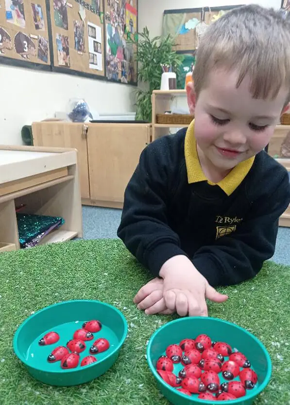 Pre-School pupils learning about 'less and more' at The Ryleys School, a private school in Alderley Edge.
