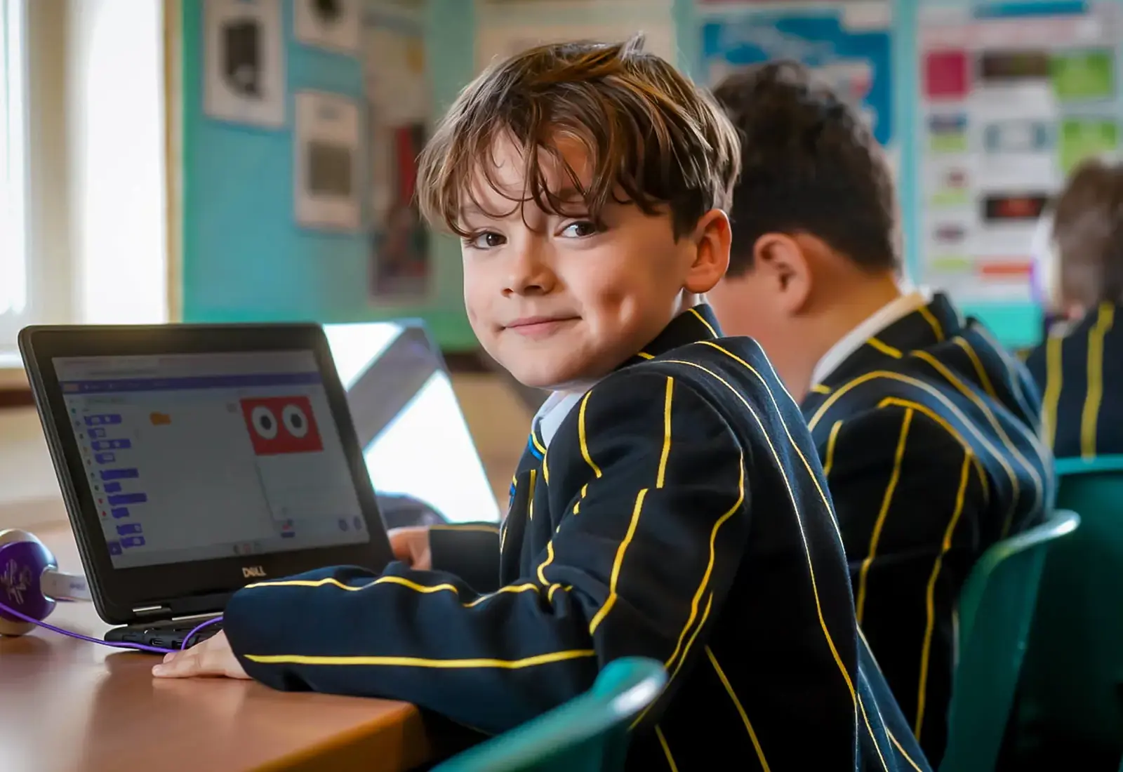 Pupil in class working on a computer at The Ryleys School, a private prep school in Alderley Edge, Cheshire.