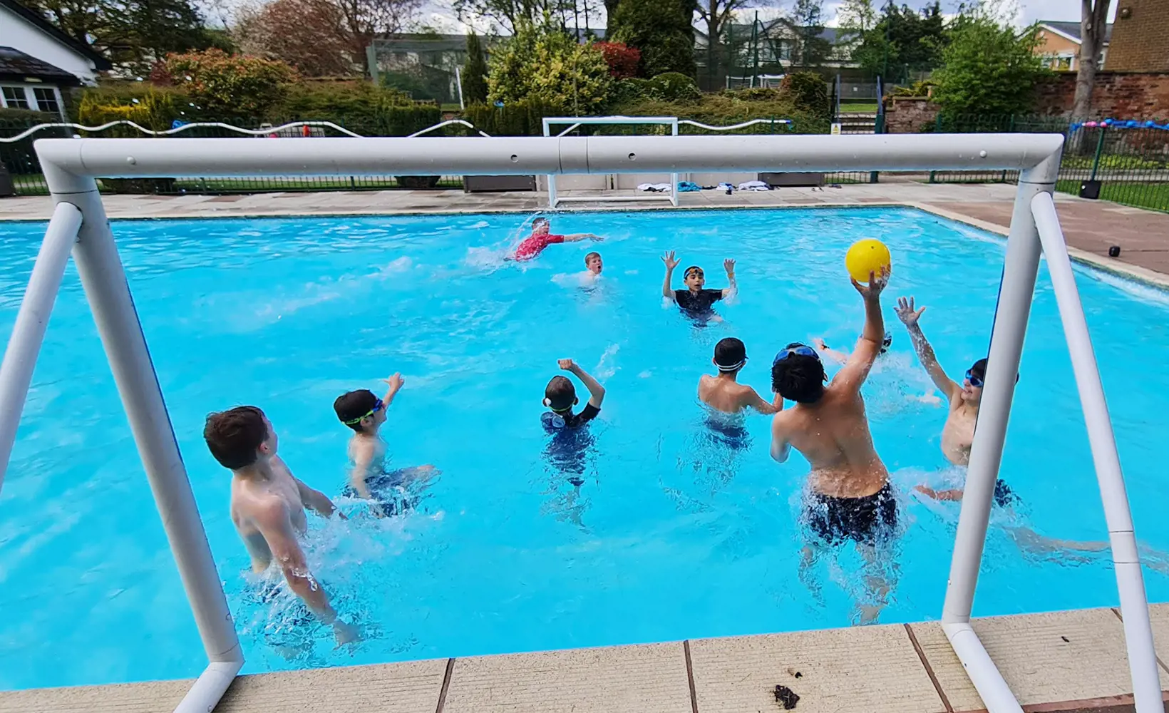 Students at The Ryleys School, Cheshire, playing in the swimming pool