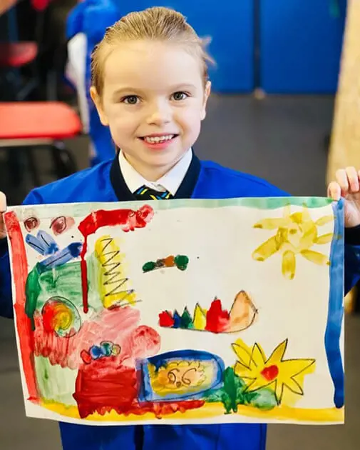 A pupil at The Ryleys School, a private school in Cheshire, showing their Kandinsky-inspired artwork